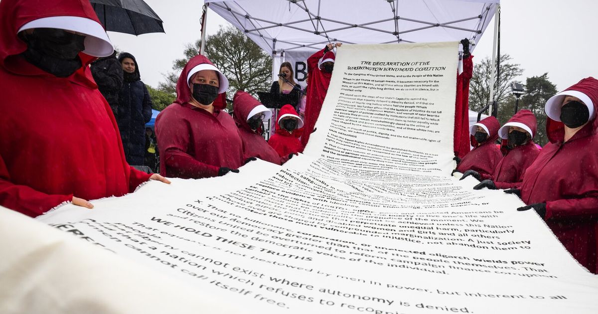 Protests & Civil Unrest: Seattle Women’s March Draws Hundreds Amid Rainy Day turnout
