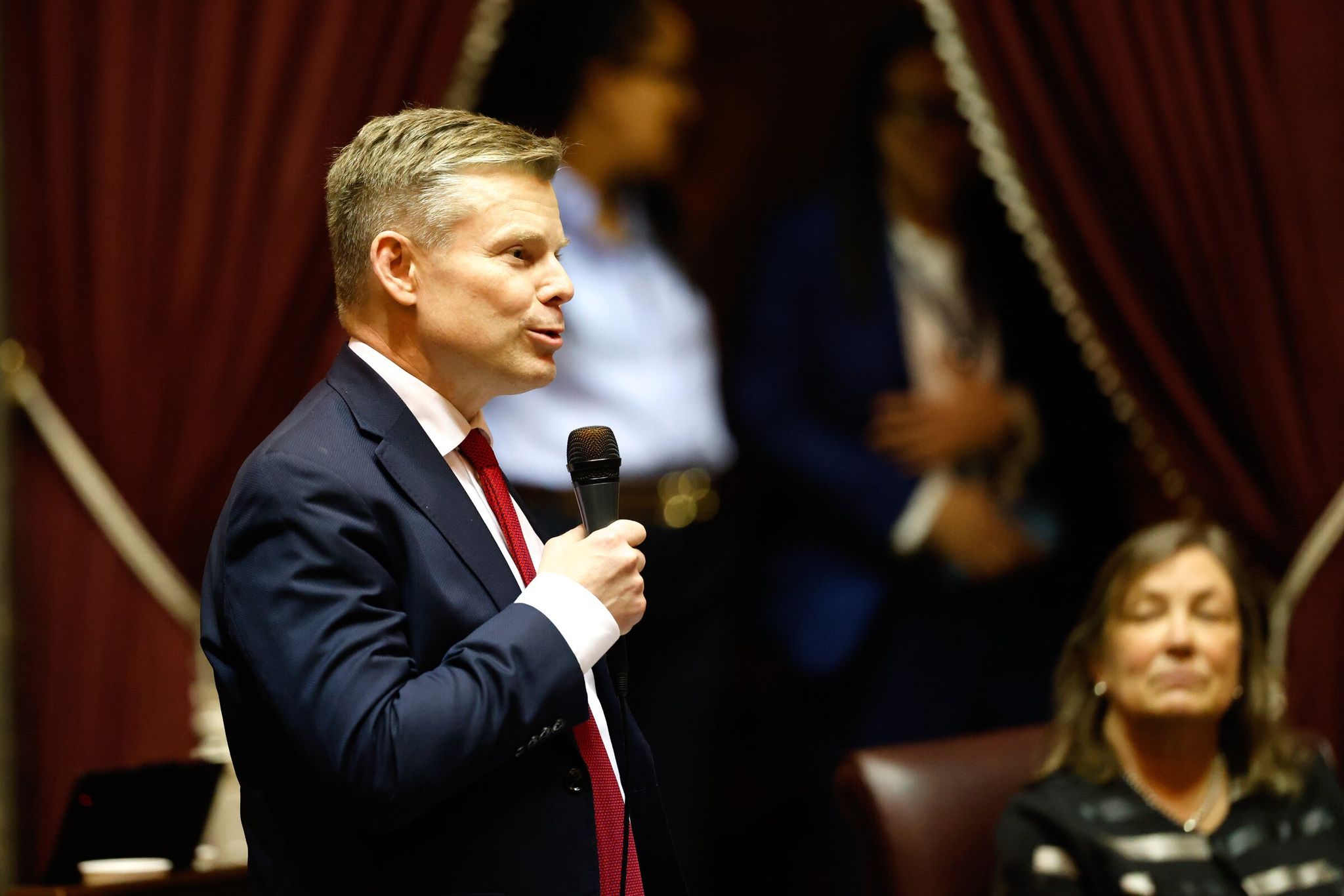 Sen. Jamie Pedersen speaks during the Senate vote on the millionaires’ tax bill in the Capitol building in Olympia earlier this month. (Karen Ducey / The Seattle Times)
