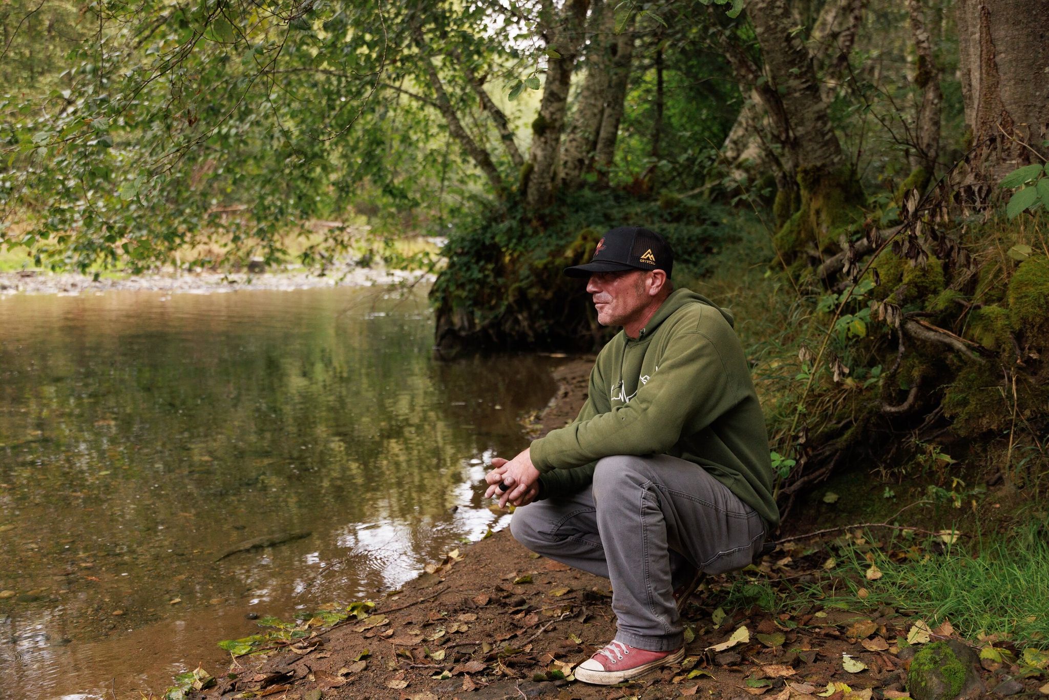 Muckleshoot fisherman and council member Louie Ungaro looks at the Greenwater River, which contains some of the last seasonal spawning channels for coho, spring and fall Chinook, steelhead and pink salmon. (Erika Schultz / The Seattle Times)