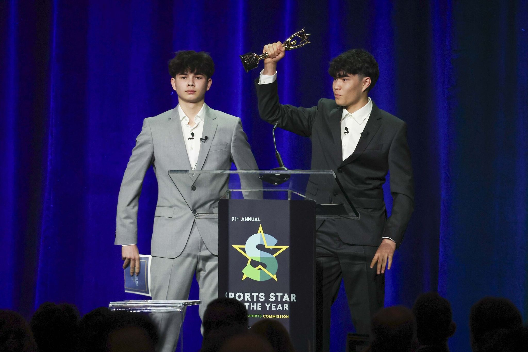 Youth Inspiration Award winners Justin and Jacob Rivera speak during the 91st annual Seattle Sports Star of the Year Awards at the Seattle Convention Center Summit in downtown Seattle on Friday, March 13, 2026. (Ivy Ceballo / The Seattle Times)