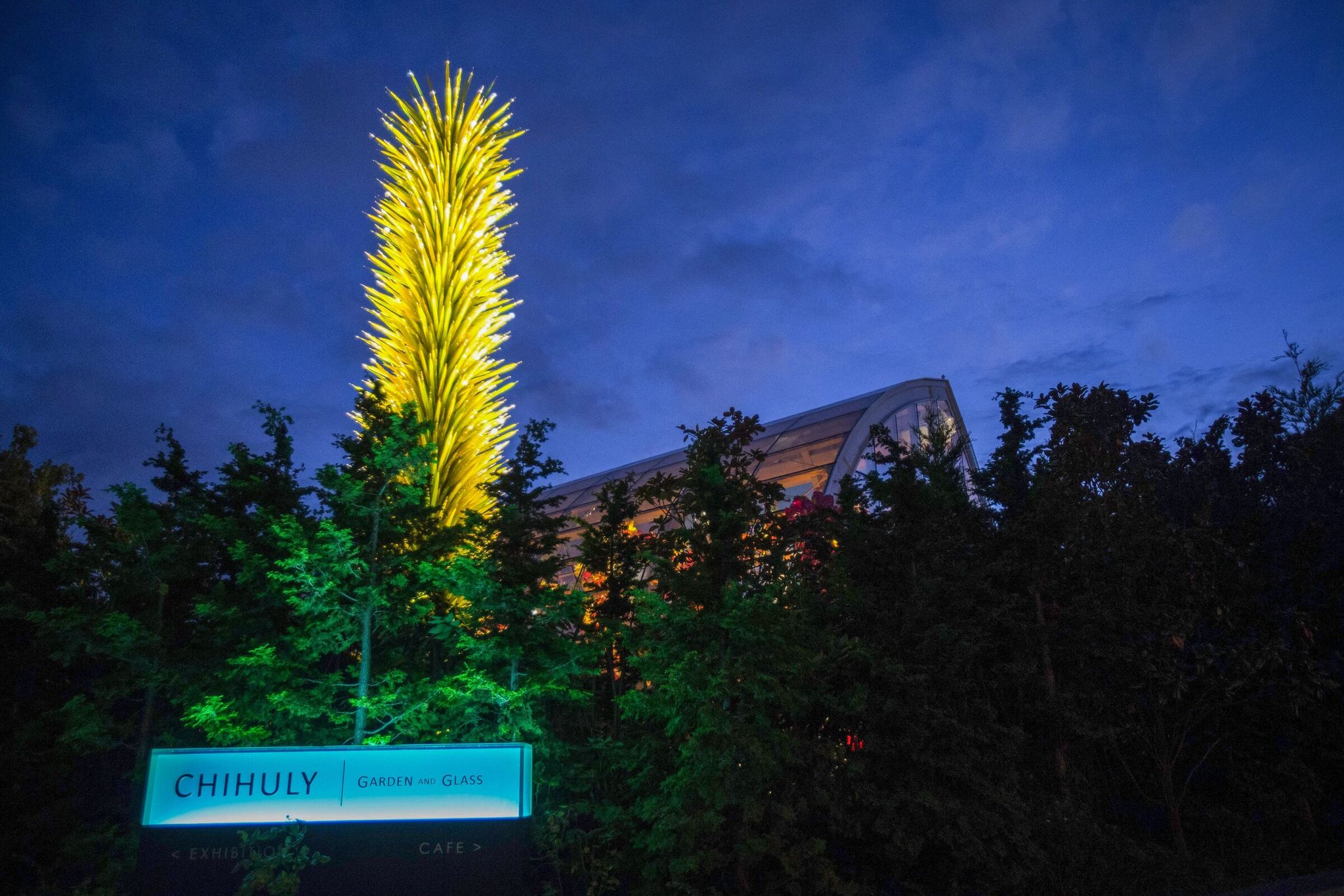The Chihuly Garden and Glass Museum glows in the fading light in the Lower Queen Anne neighborhood in 2015.   (Lindsey Wasson / The Seattle Times)