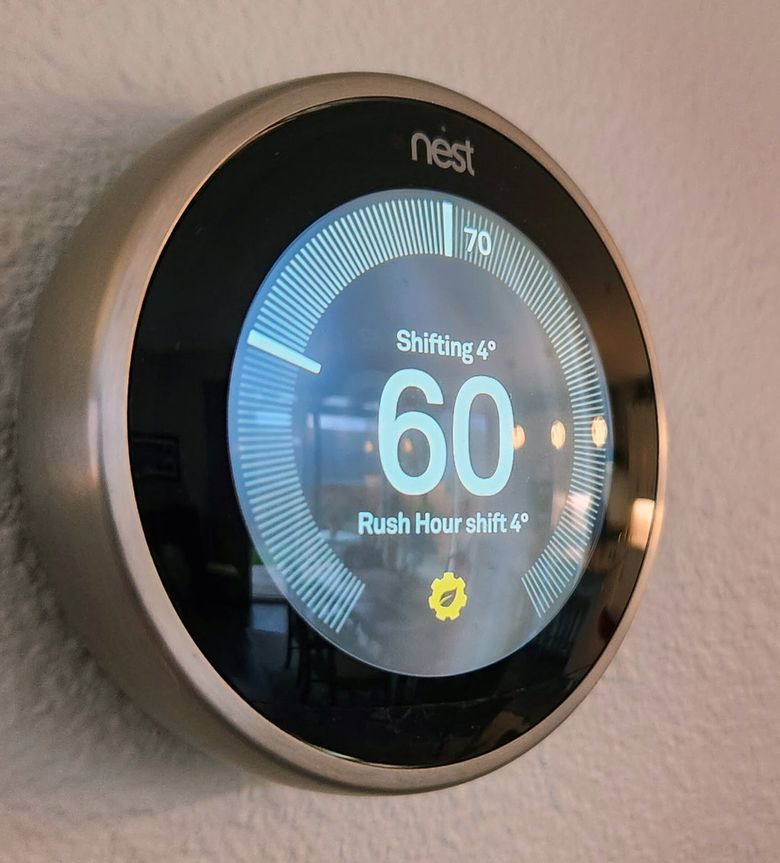 Maple Valley resident Jim Sullivan’s thermostat automatically adjusted to 60 degrees during a recent “rush hour” event, four degrees lower than he had it set. Utilities, facing pressure over rising rates and affordability concerns, are asking customers to help them manage the costs of increasingly expensive spikes by using less at certain times. (Courtesy of Jim Sullivan)