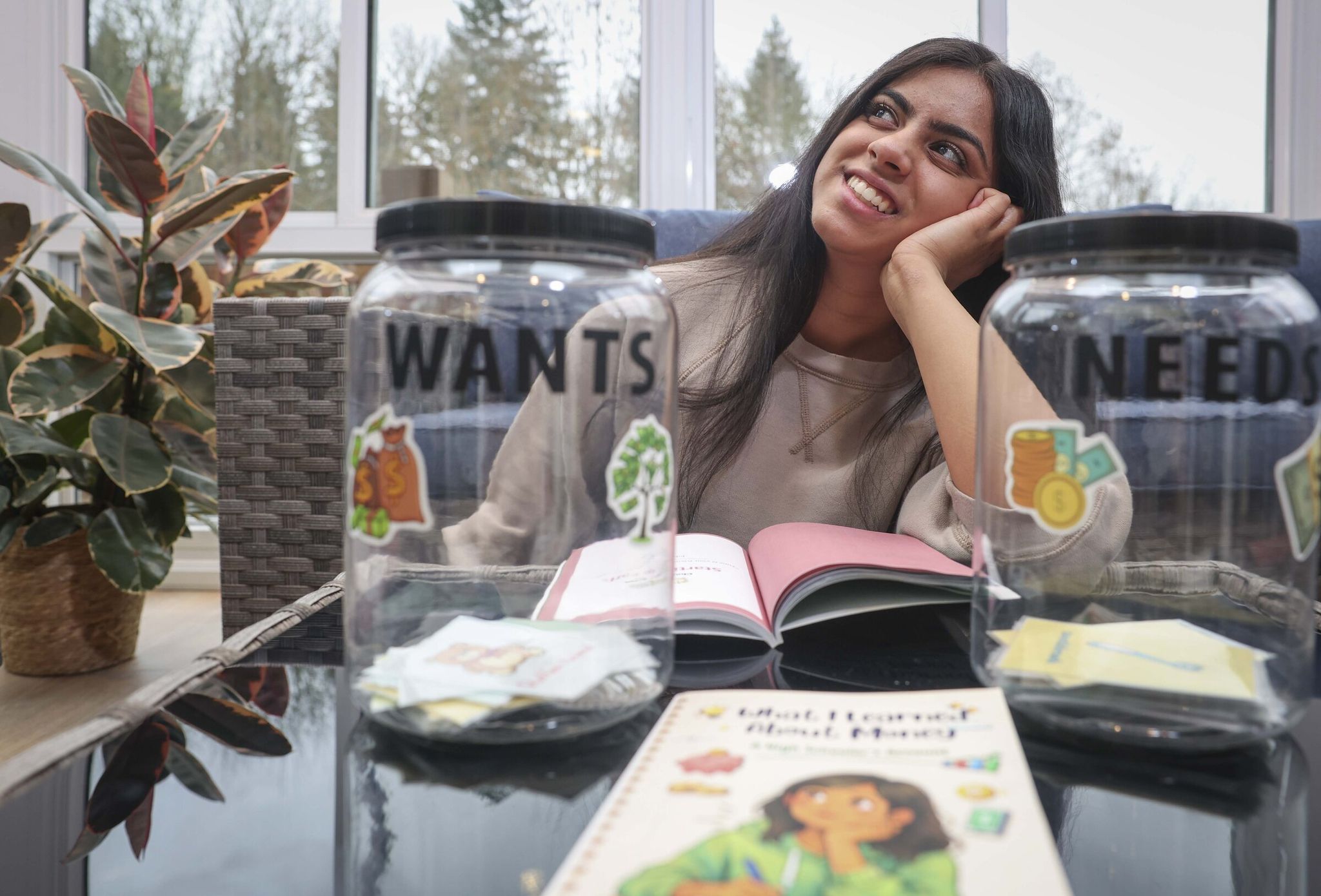 Siddhi Tandon, 17, poses for a portrait at her family's home in Redmond on March 18. (Ivy Ceballo / The Seattle Times)