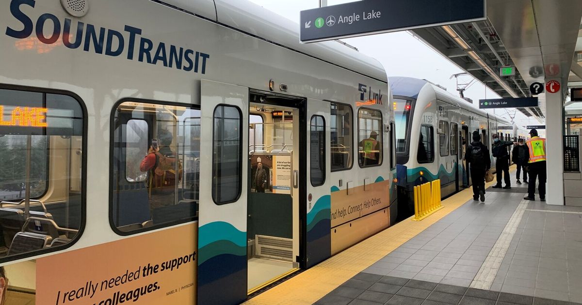 Prosecutors accused a 26-year-old man of sneaking up behind another man, then pushing him toward an oncoming train last week at Northgate station, records show.