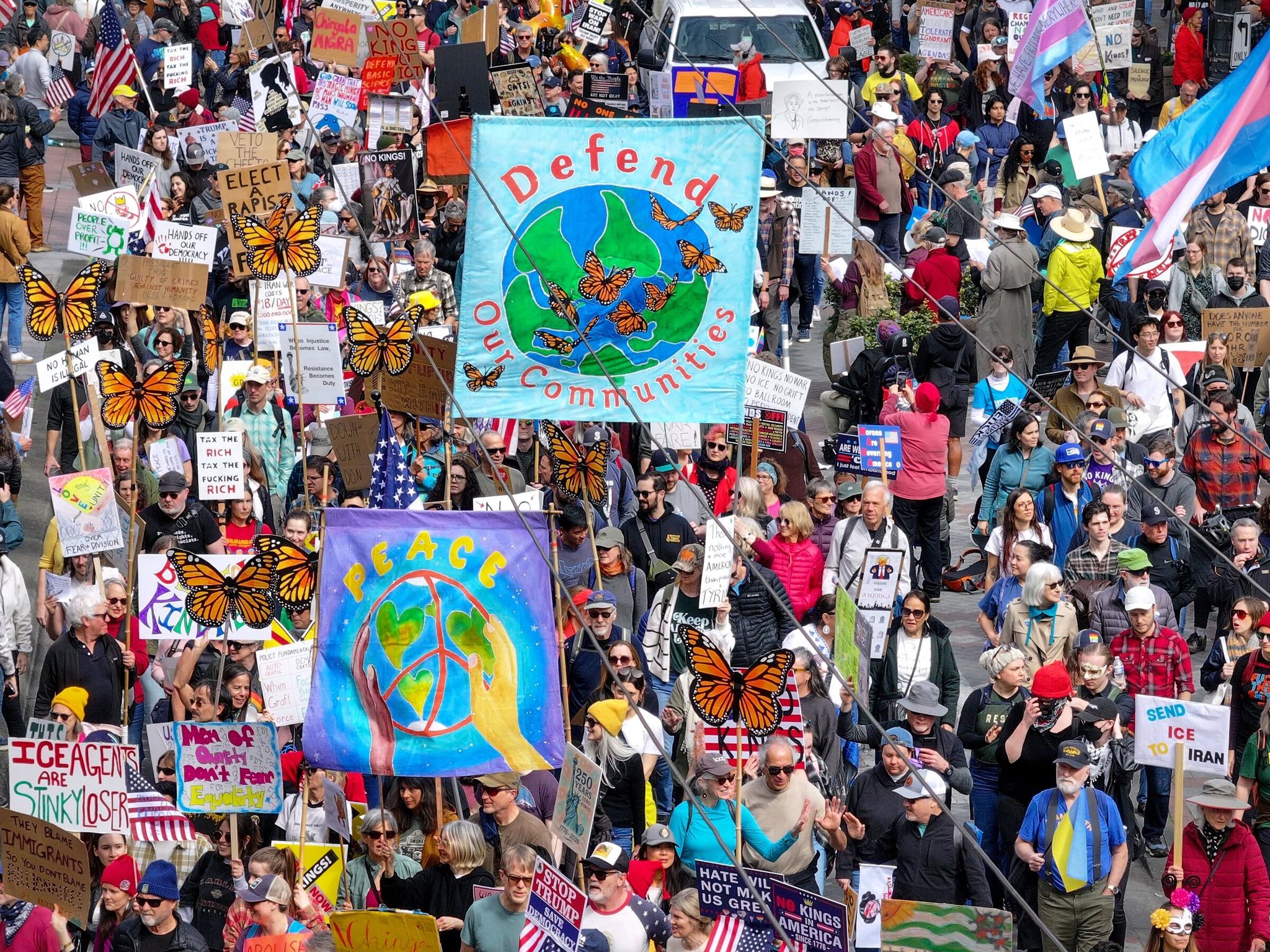 A sea of protesters moves down Pine Street in downtown Seattle near Westlake Park as the third 'No Kings' march proceeds from Cal Anderson Park to Seattle Center on Saturday. (Karen Ducey / The Seattle Times)