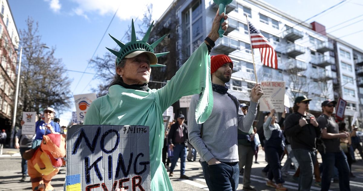 “This to me looks like history is being made,” said Nick Brown at a massive rally in Seattle. Protesters had much to say about ICE, Iran and the Epstein files.