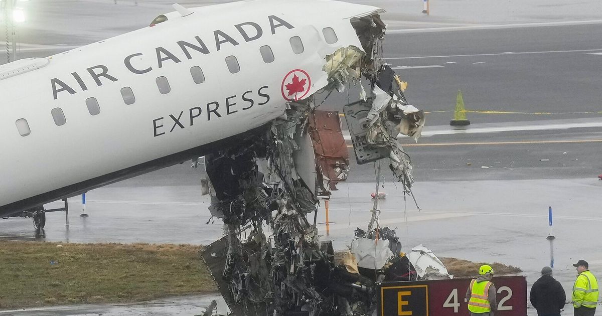 FAA moves to fire 2 air controllers at LaGuardia after deadly crash