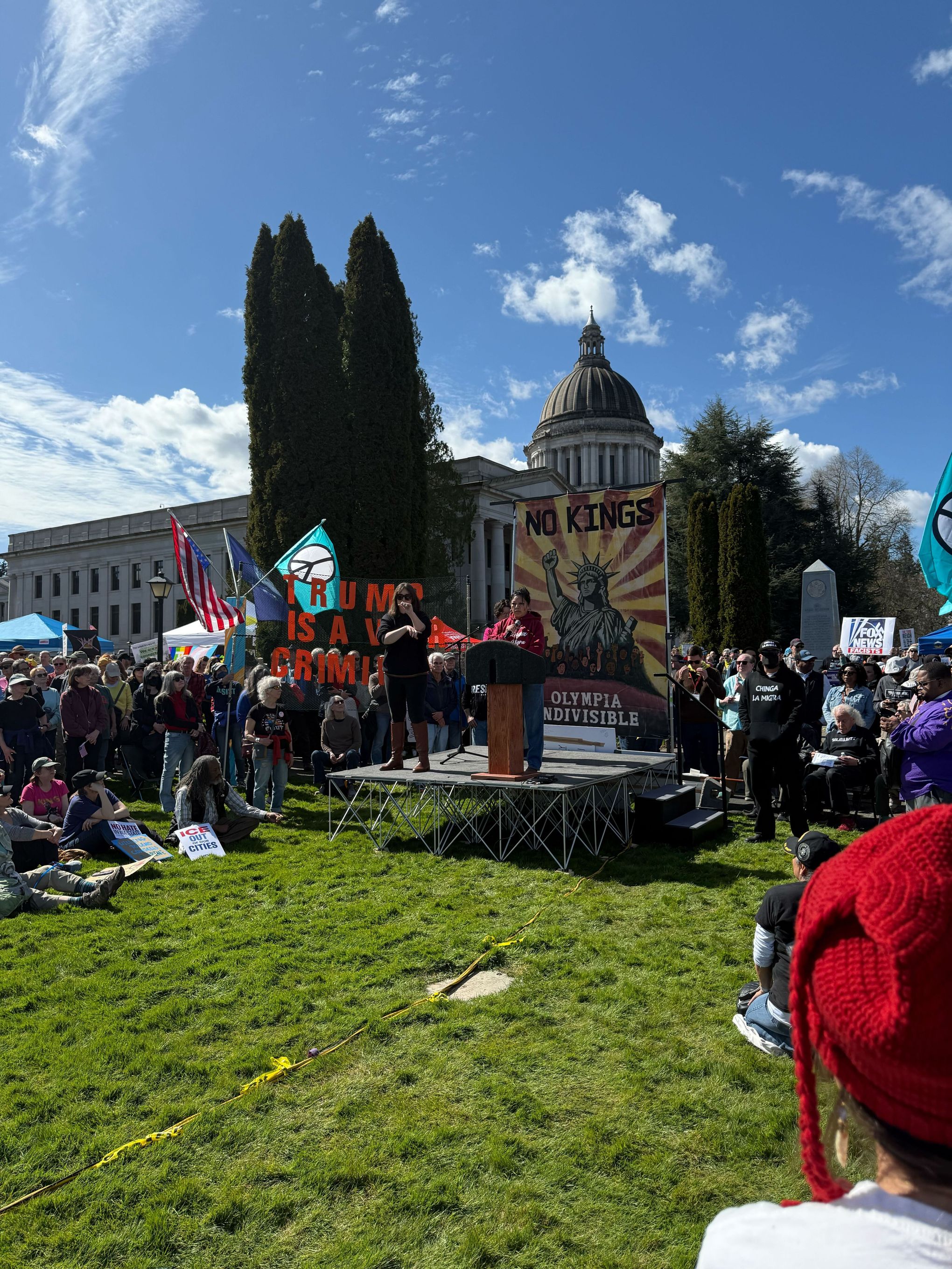 Rufina Reyes, executive director of La Resistencia, speaks to a large crowd in Olympia about violence by ICE agents on March 28, 2026.