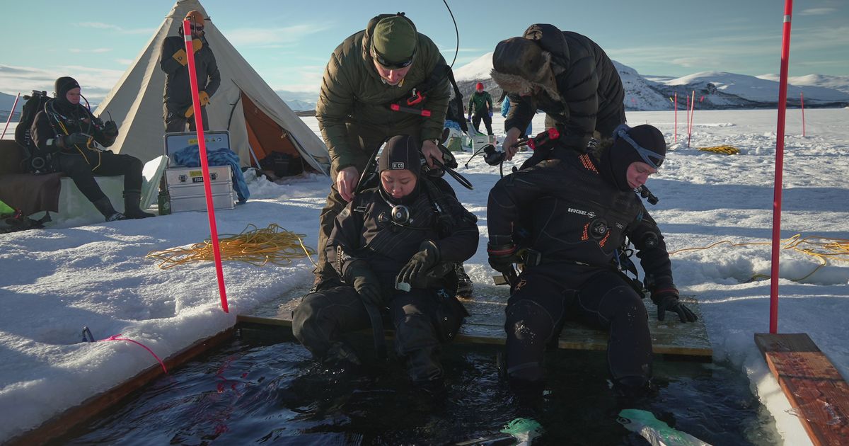Scientists train to dive beneath polar ice as climate change warms the Arctic and Antarctica