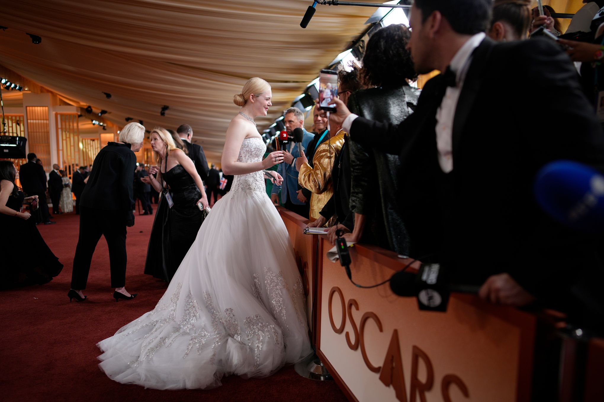 Stars deliver modern and colorful looks on Oscars red carpet | The Seattle  Times