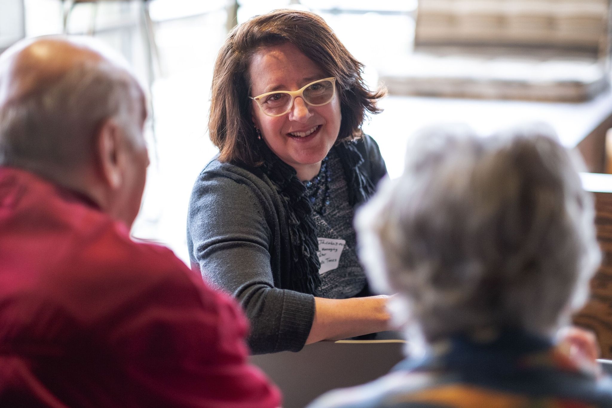 The Seattle Times managing editor Lynn Jacobson meets readers at a fundraiser supporting the paper’s investigative journalism. (Dean Rutz / The Seattle Times, 2019)