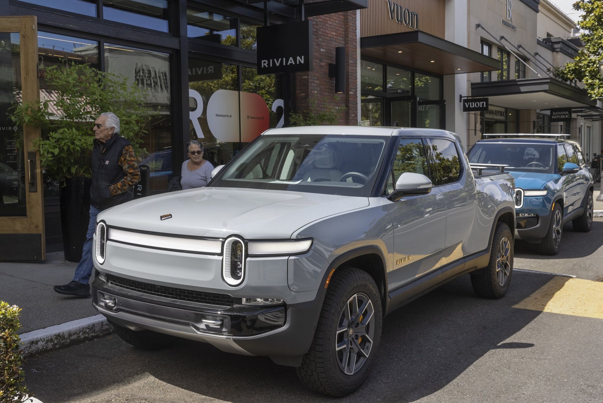 Rivian, which has a showroom in University Village, and fellow EV maker Lucid will join Tesla in being able to sell their cars directly to consumers after the new state law takes effect in June. (Ellen M. Banner / The Seattle Times, 2024)