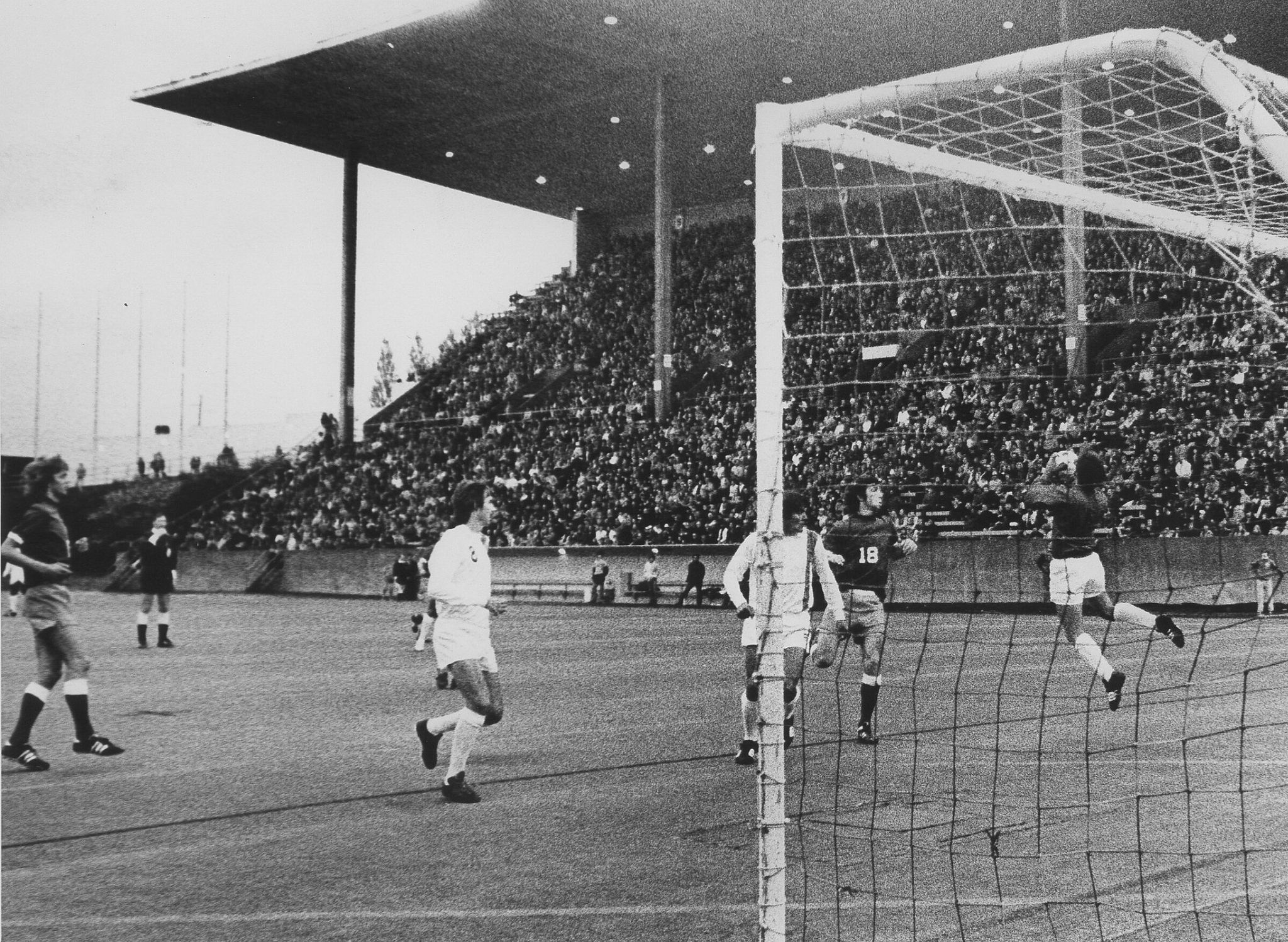 When the Sounders debuted in 1974, 12,132 fans watched goalkeeper Mike Poul of the Denver team make a diving save after a Seattle Sounders shot at Memorial Stadium on opening day. (Vic Conditti / The Seattle Times, archive photo)