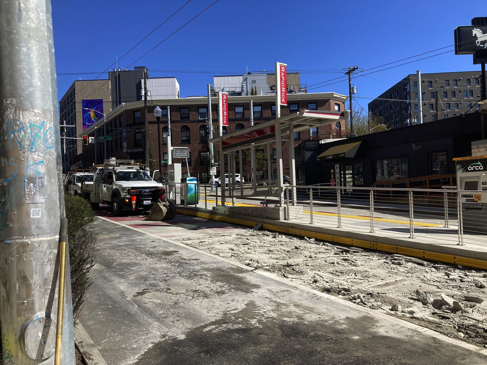 The street at a RapidRide bus stop on Madison Street is torn up on March 26. (Courtesy of Don Glickstein)