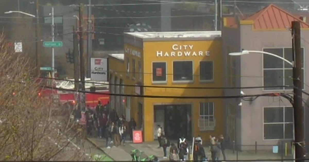 Seattle Fire Department firetrucks blocked access to Ninth Avenue North between Republican and Thomas streets around noon Friday.