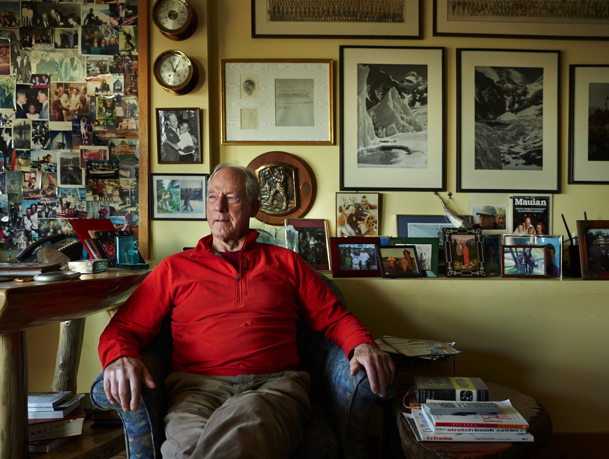 Jim Whittaker, the first American to climb Mount Everest, in his home study. Photographs pinned to the corkboard reflect his life: from playing basketball in his youth to his passion for mountaineering and meetings with several U.S. presidents. He became a close friend of Robert F. Kennedy and was a pallbearer at his funeral in 1968. (Benjamin Benschneider / The Seattle Times, 2013)