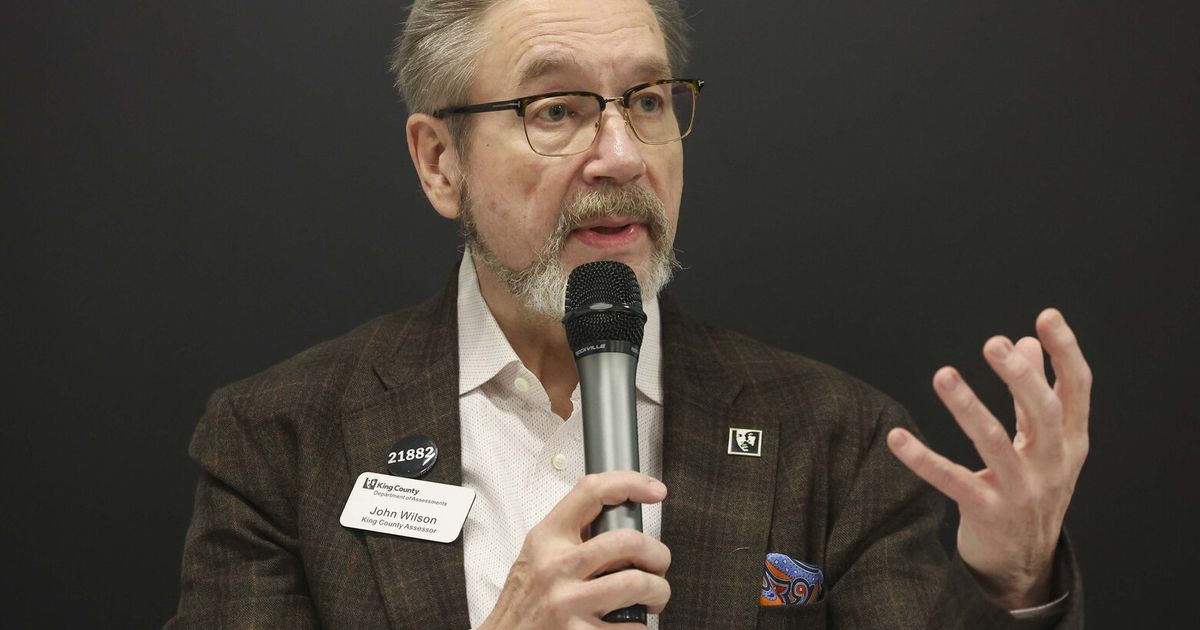 King County Assessor John Wilson pleaded not guilty Wednesday to two counts of violating a court order, nine months after he was arrested outside of his ex-fiancée’s home and accused of stalking her.