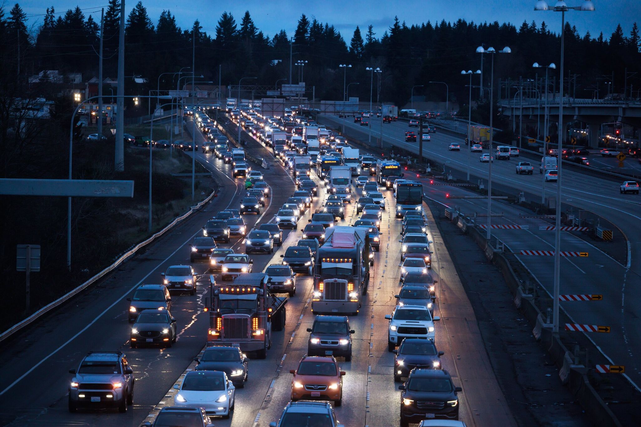 Drivers move in heavy southbound traffic on Interstate I‑5 on Jan. 13. (Erika Schultz / The Seattle Times)