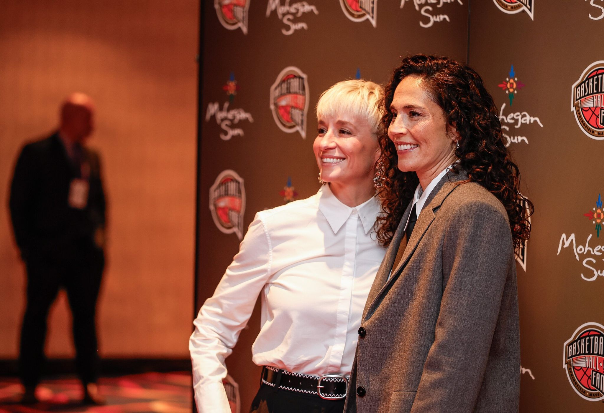 Sue Bird (right) walks the red carpet at the Naismith Basketball Hall of Fame with Megan Rapinoe in Ancasville, Conn. (Dean Rutz / The Seattle Times, 2025)