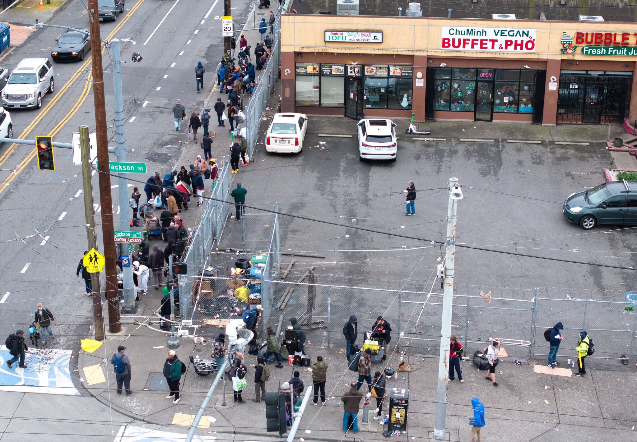 “It’s become an embarrassment for the city,” Tanya Nguyen, owner of ChuMinh Tofu, said about the drug dealing and selling of stolen goods at 12th and Jackson. (Karen Ducey / The Seattle Times)
