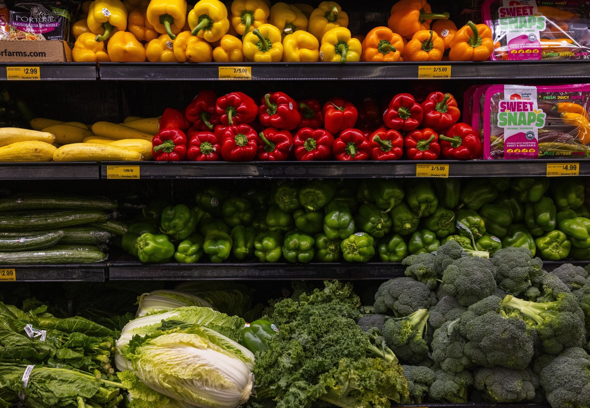 The Central District Grocery Outlet produce section in Seattle. The city is offering $80 gift cards to older adults in King County with low incomes so they can buy fresh fruits and vegetables at farmers markets. (Ken Lambert / The Seattle Times, file)