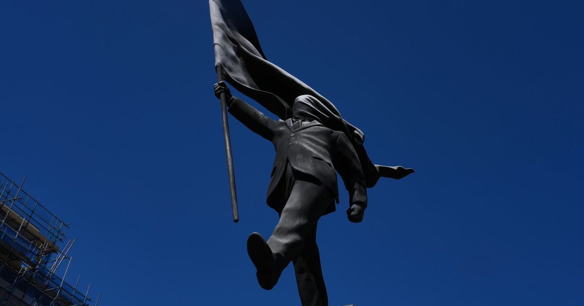 Banksy confirms a new statue in central London of a man blinded by a flag is his work