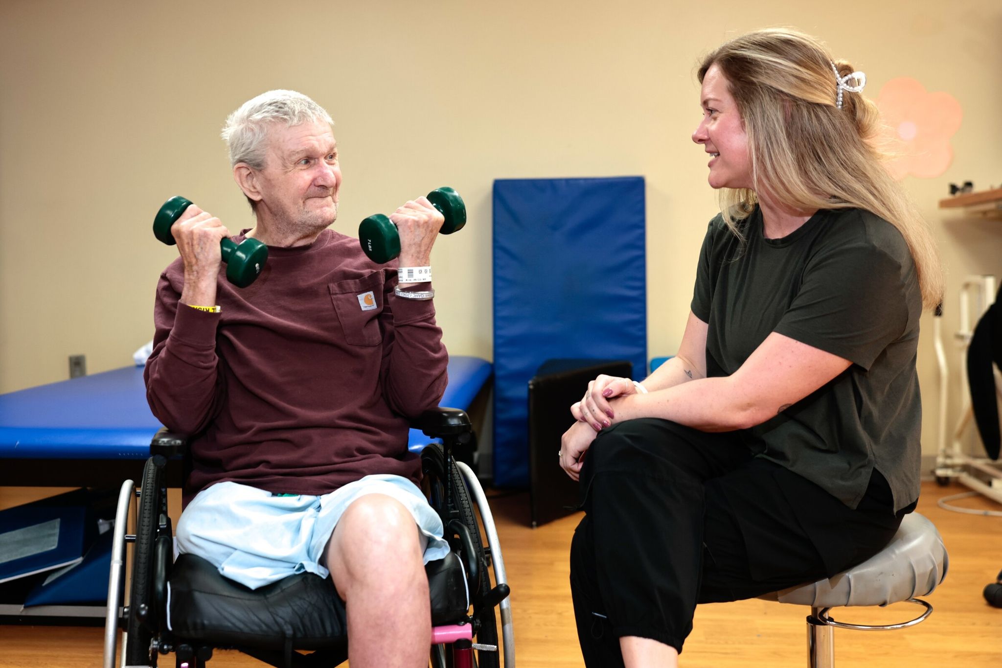 'They are my angels,' Allen Horne said of his rehabilitation team at Queen Anne Healthcare. After the infection forced surgeons to amputate his leg, he worked hard, doing daily exercises and rebuilding strength. (Karen Ducey / The Seattle Times)