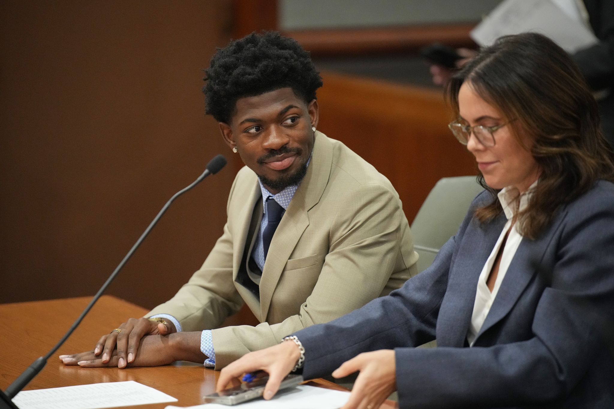 Lil Nas X, whose real name is Montero Lamar Hill, appeared in court on charges in four criminal counts, including three counts of assaulting a police officer in Los Angeles on March 12. (Daniel Cole/Pool/AP)