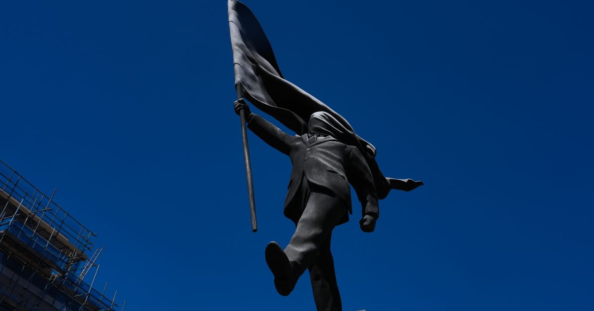 Banksy confirms a new statue in central London of a man blinded by a flag is his work