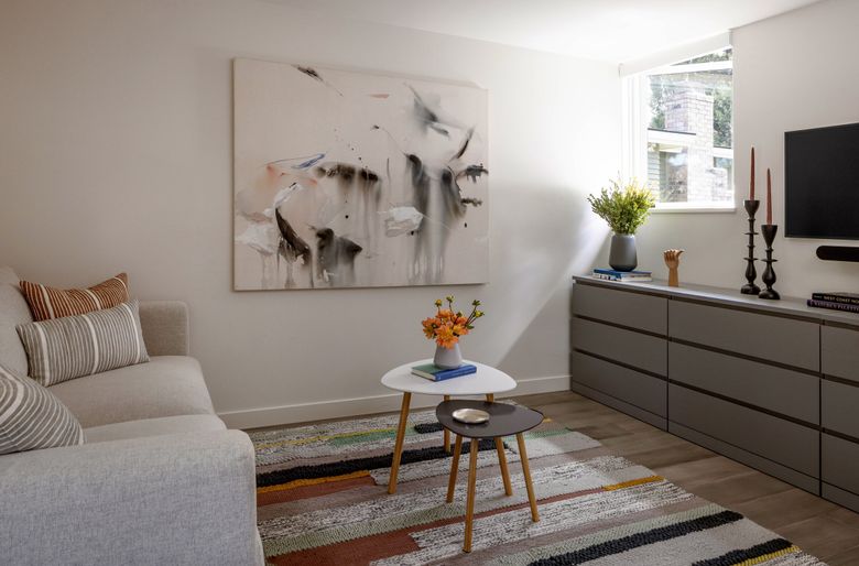 A sitting room gives guests a place to relax. In the future, the structure could be a full-time residence, adding to the variety of housing stock in the area. (Rafael Soldi / Courtesy of DeForest Architects)