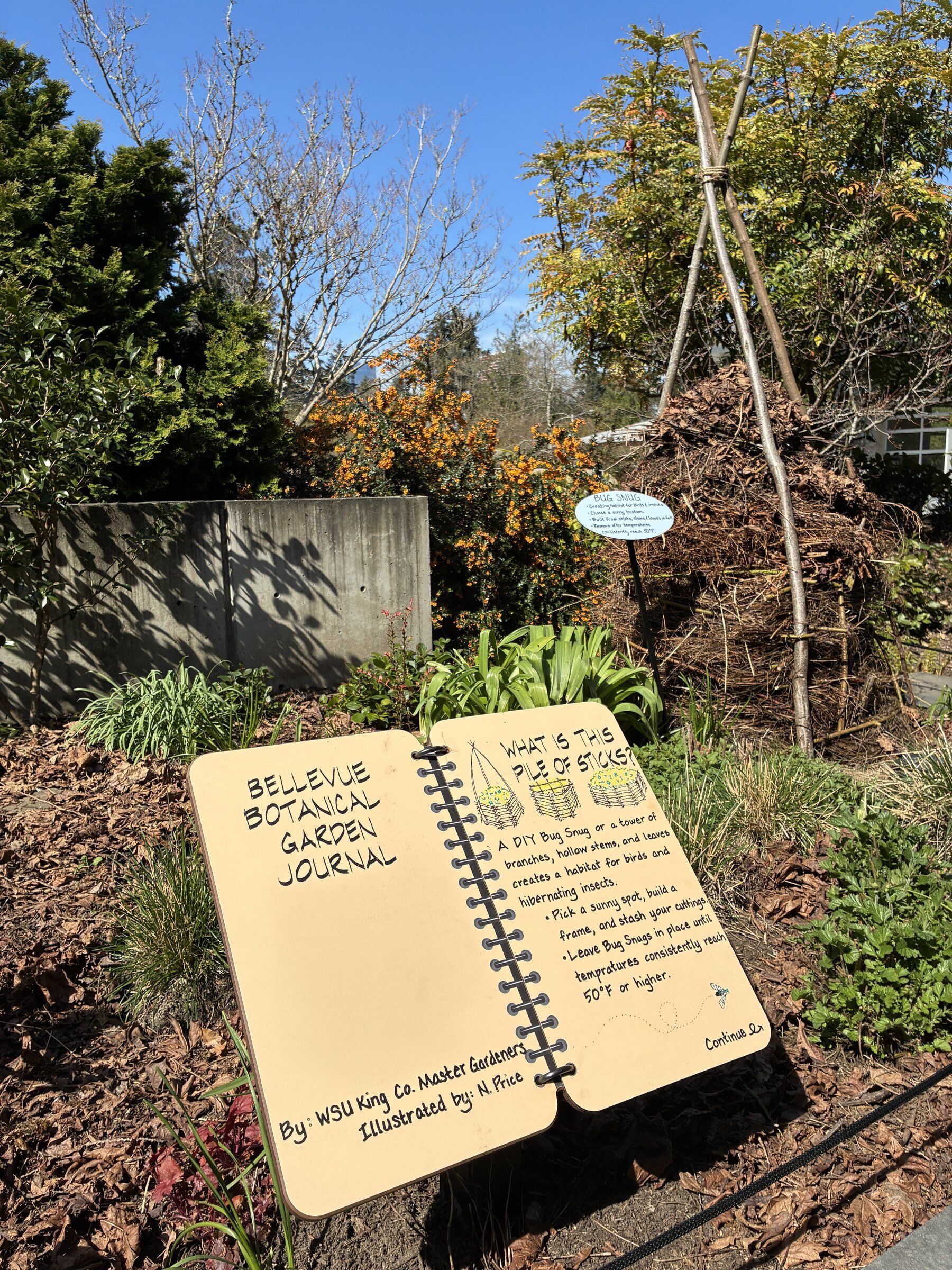 An interactive “journal” in the Habitats at Home landscape explains wildlife‑friendly features of the garden, including a bug house that creates habitat for birds and insects. (James Gagliardi)
