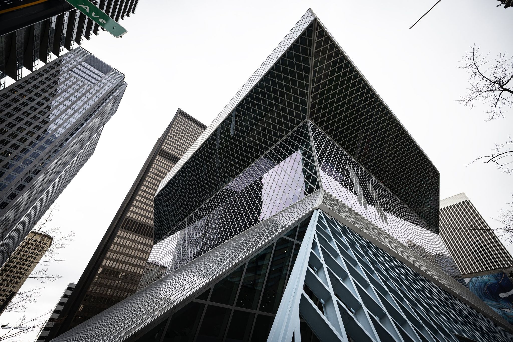 Looking up at the Seattle Central Library in downtown Seattle. The library system’s 27 locations had more than 3.4 million in-person visits last year. (Ken Lambert / The Seattle Times)