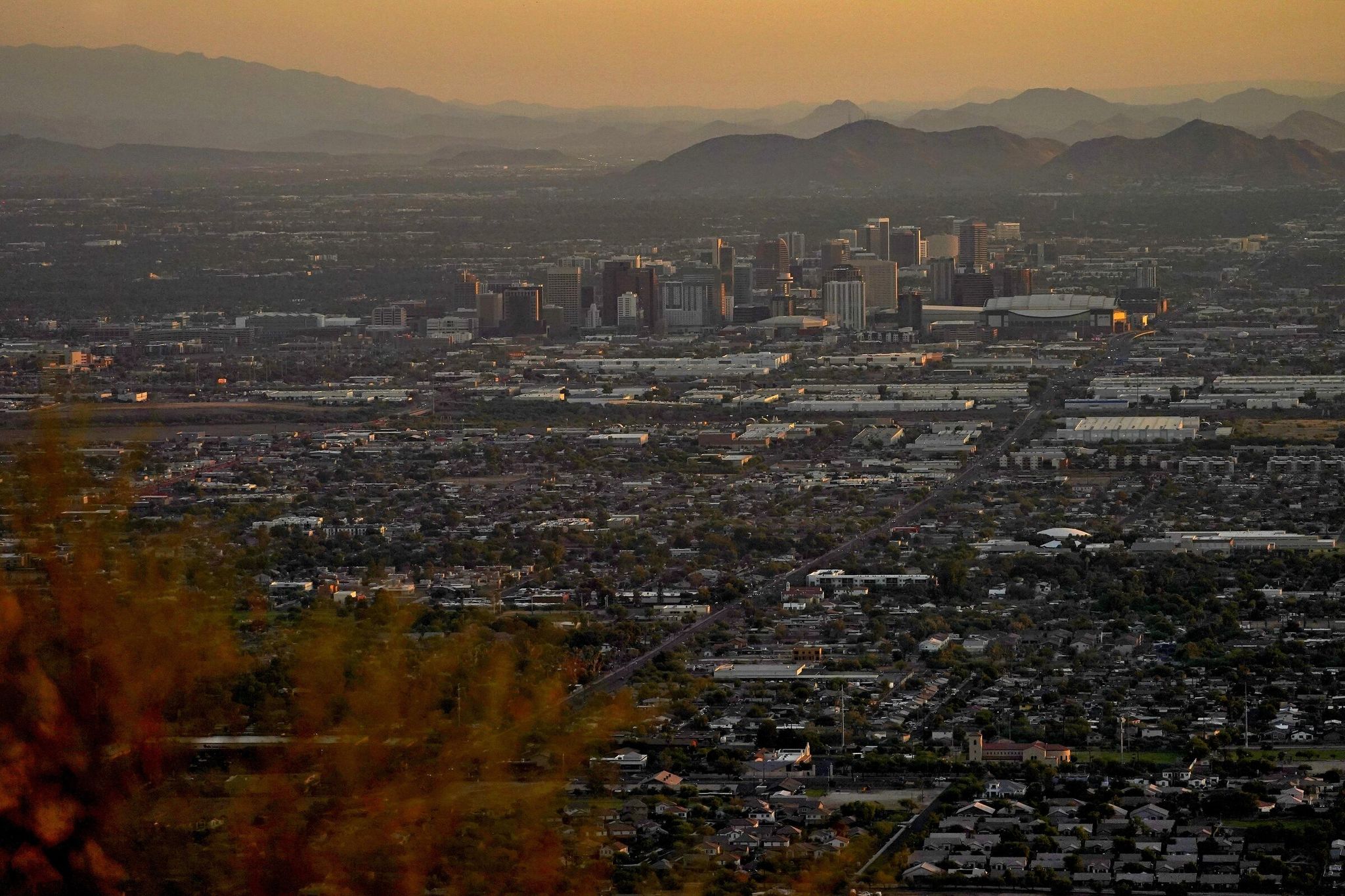 Day breaks over downtown Phoenix. About 19,000 Washington residents moved to Arizona between 2000 and 2024, compared to 8,800 who moved from the desert to the Evergreen State. (AP Photo/Matt York) (Matt York / AP)