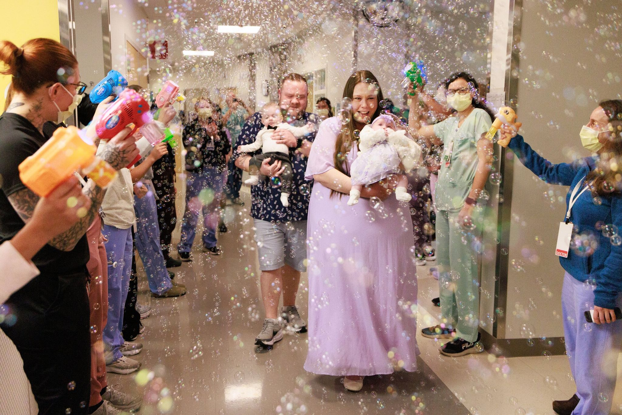 Staff at Seattle Children’s held a bubble farewell on April 30 when 6-month-old Maxine was discharged home to her parents and twin brother Jackson. (Erika Schultz / The Seattle Times)