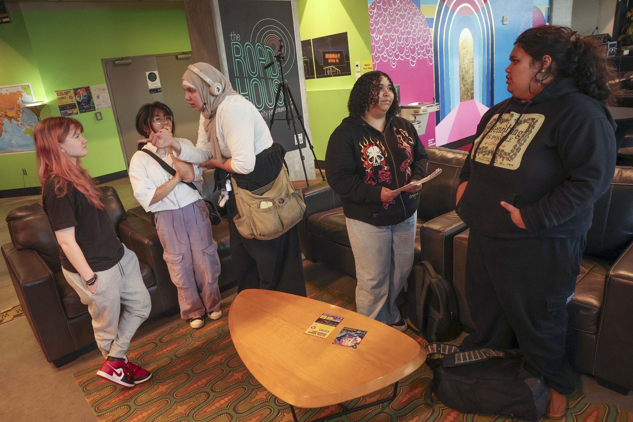 Students talk about what they learned in a production workshop at The Roadhouse public concert space in Seatac on April 30. (Ivy Ceballo / The Seattle Times)