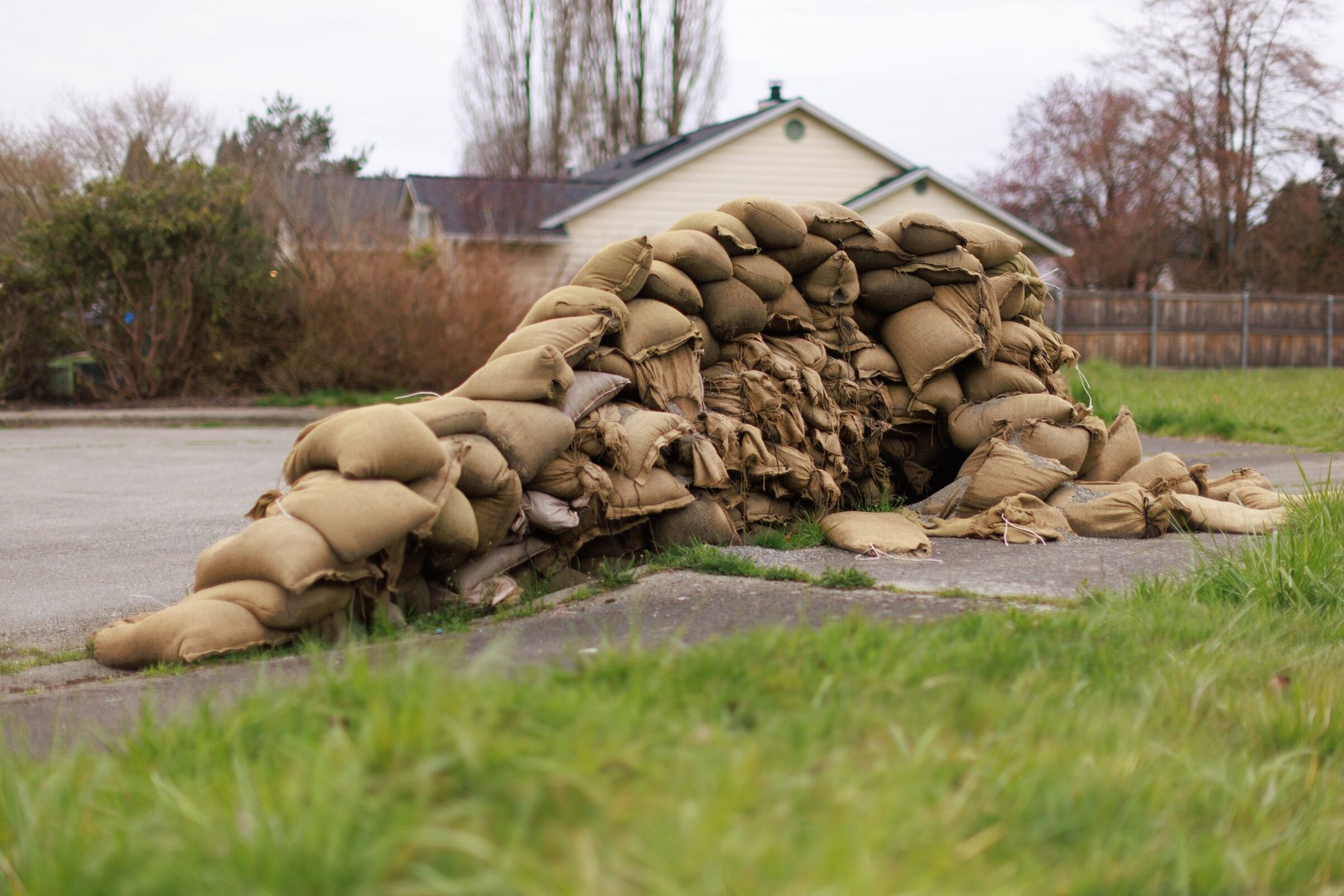 Sandbags piled throughout the White River Estates area and the city of Pacific — a common sight even months after the large December flood. (Erika Schultz / The Seattle Times)