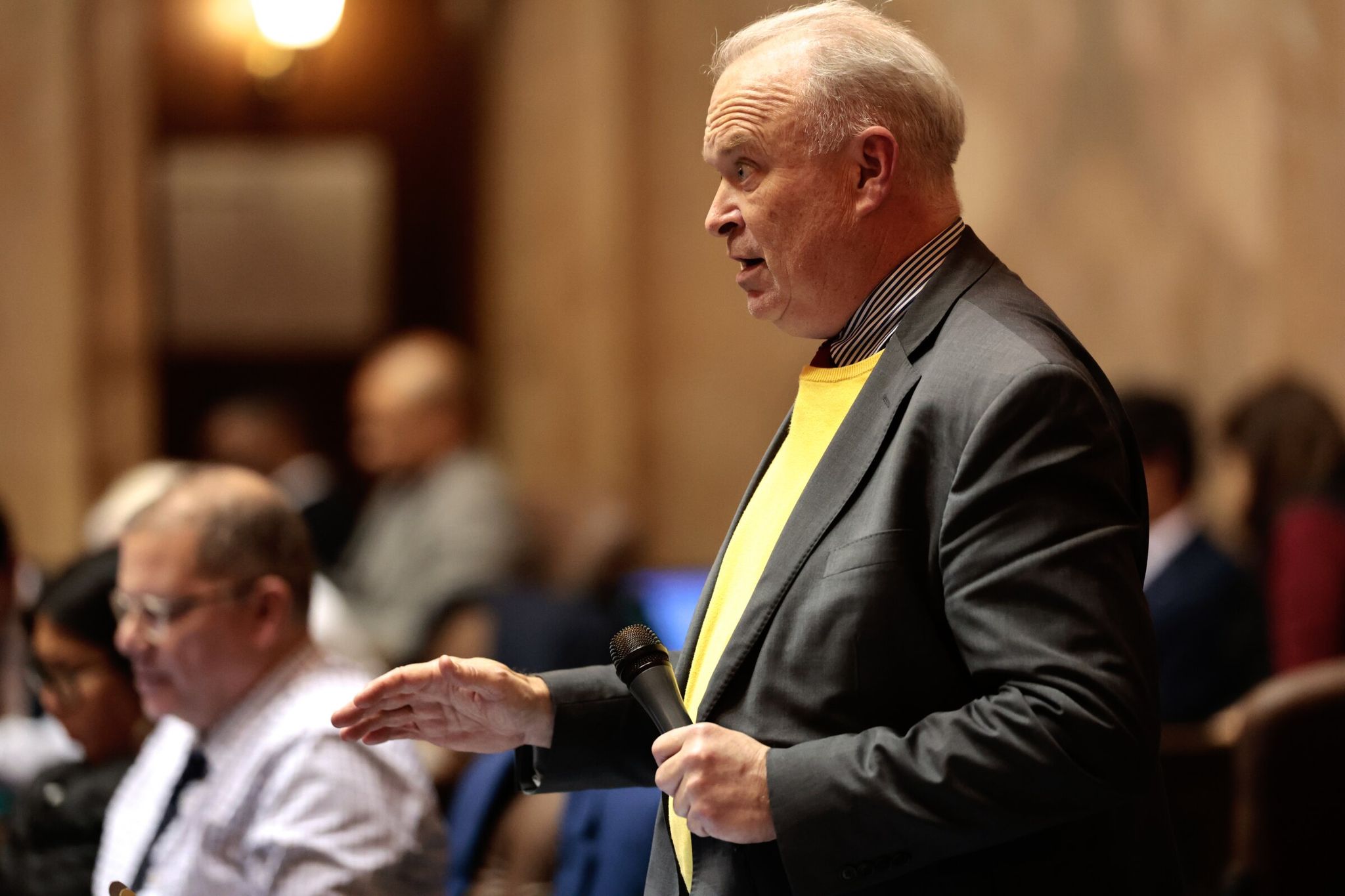 Rep. Jim Walsh discusses an income tax measure at a House session in the state Capitol building in Olympia on March 10. (Karen Ducey / The Seattle Times)