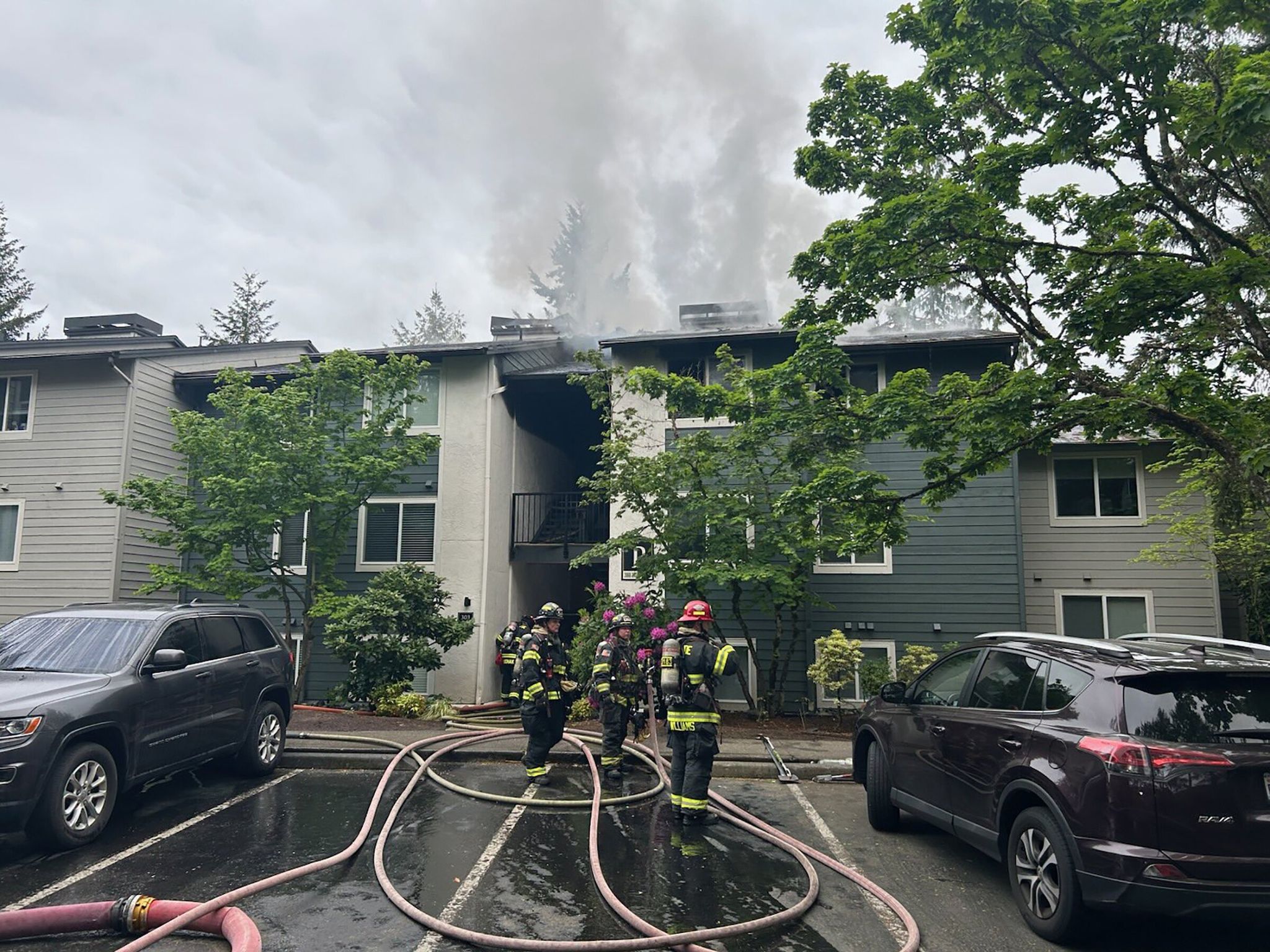 Crews respond to an apartment fire Sunday in Sammamish. The fire was contained to one unit with two victims pulled from the unit with life-threatening injuries. (Eastside Fire & Rescue)