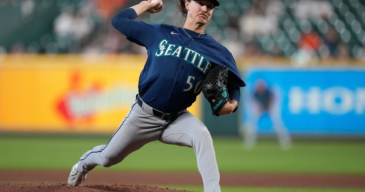 Cal Raleigh exits early as Astros rally to beat Mariners in extras