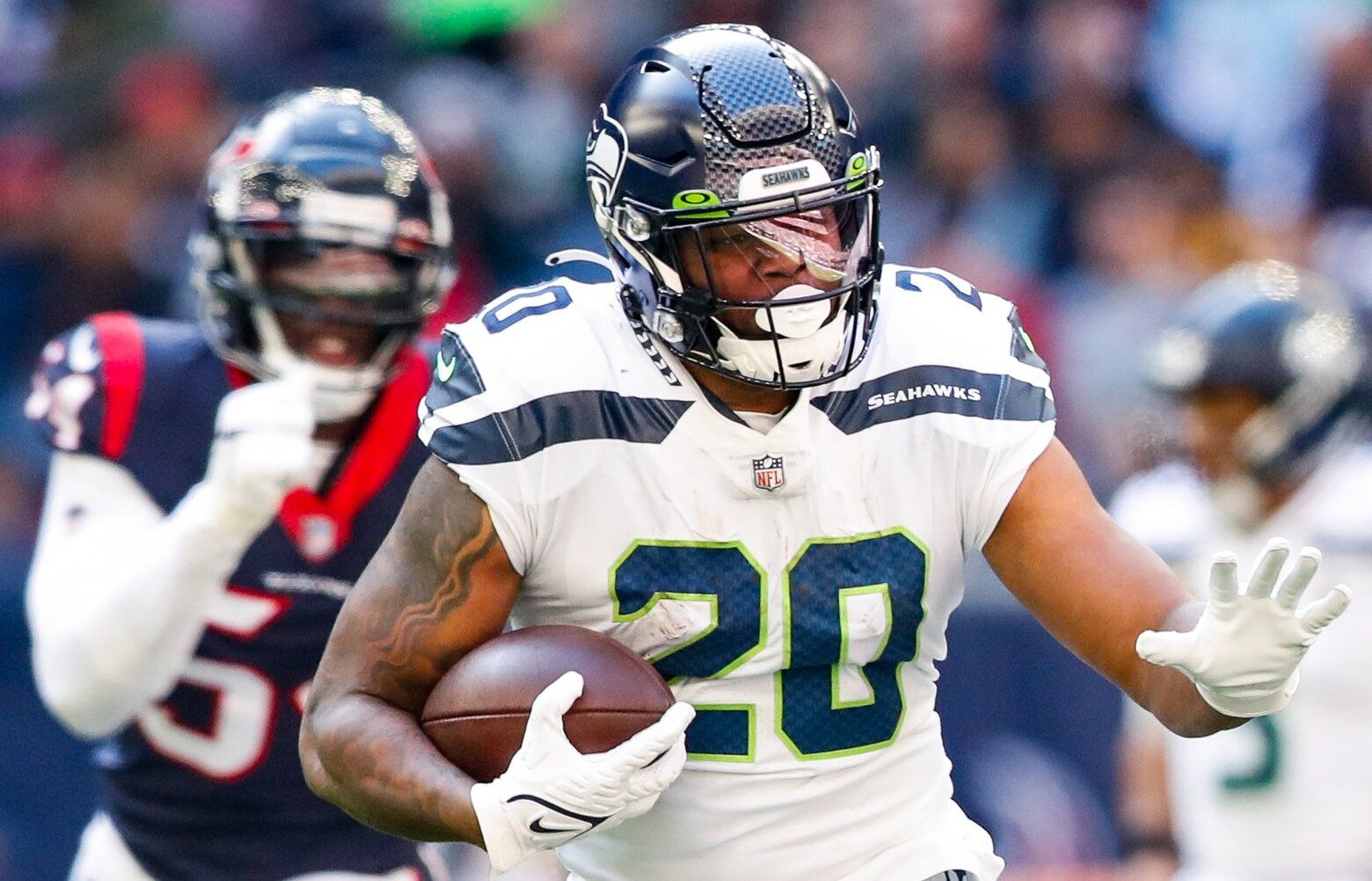 NRG Stadium – Seattle Seahawks at Houston Texans – 121221
Seattle Seahawks running back Rashaad Penny gets past Houston Texans cornerback Desmond King and eyes safety Justin Reid on his way to a 32-yard touchdown run during the first quarter Sunday, Dec. 12, 2021, in Houston. 219058