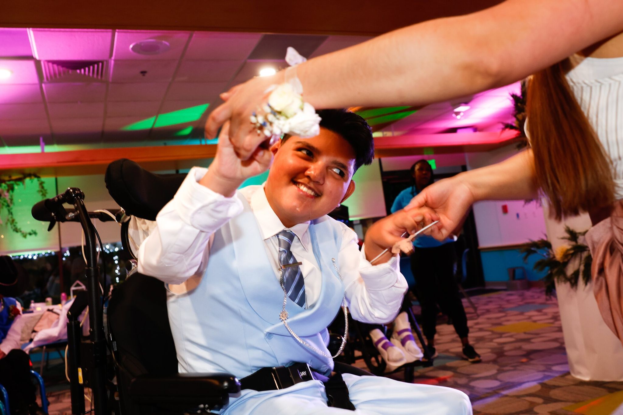 Elizabeth Torres dances with her son Manny, 17, at Seattle Children’s first prom. Manny loves Lady Gaga and Pitbull. (Karen Ducey / The Seattle Times)