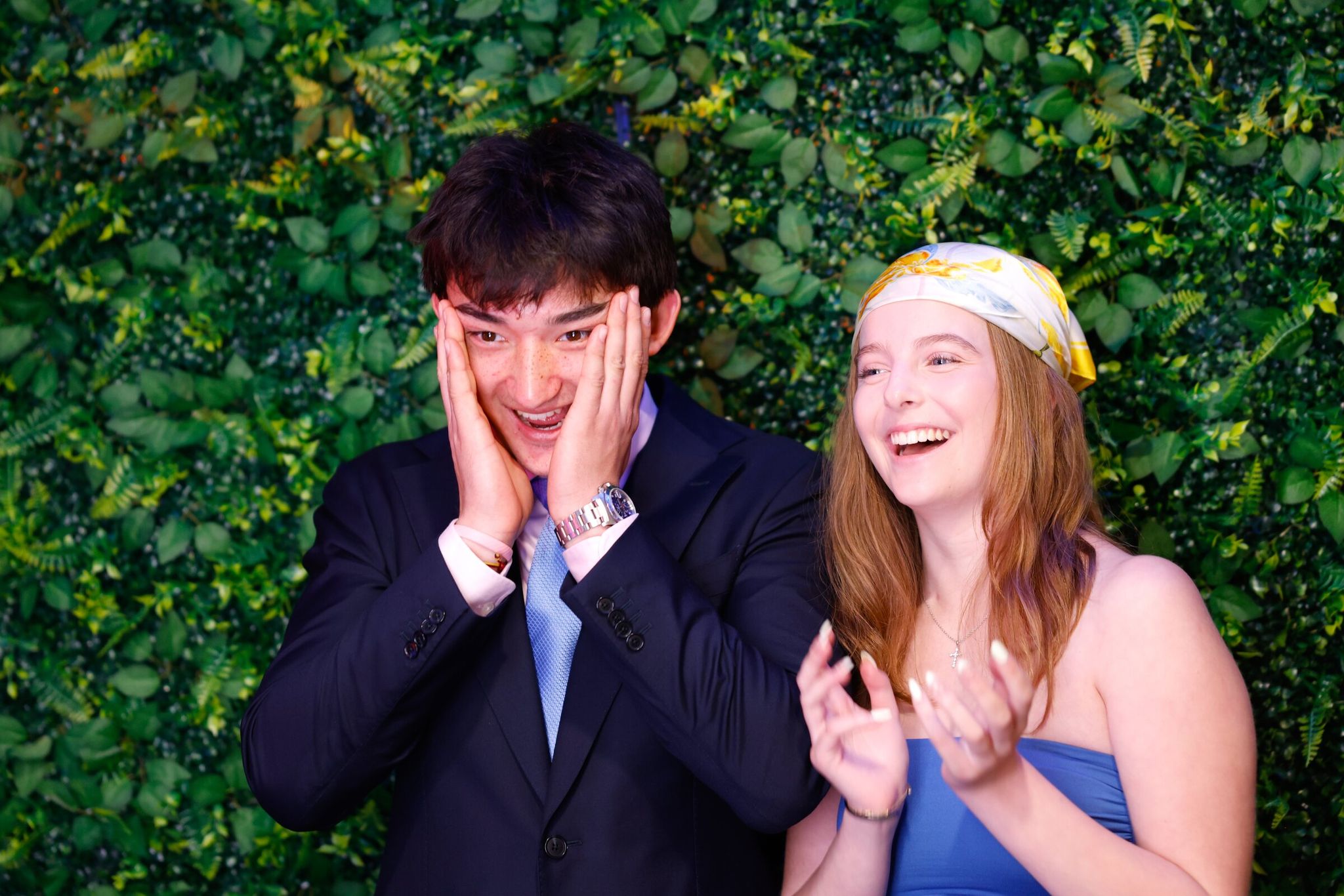 Evan Prokop, 18, left, and Brooke Novak, 18, pose in a photo booth set up by studio LS at Seattle Children’s first prom. (Karen Ducey / The Seattle Times)