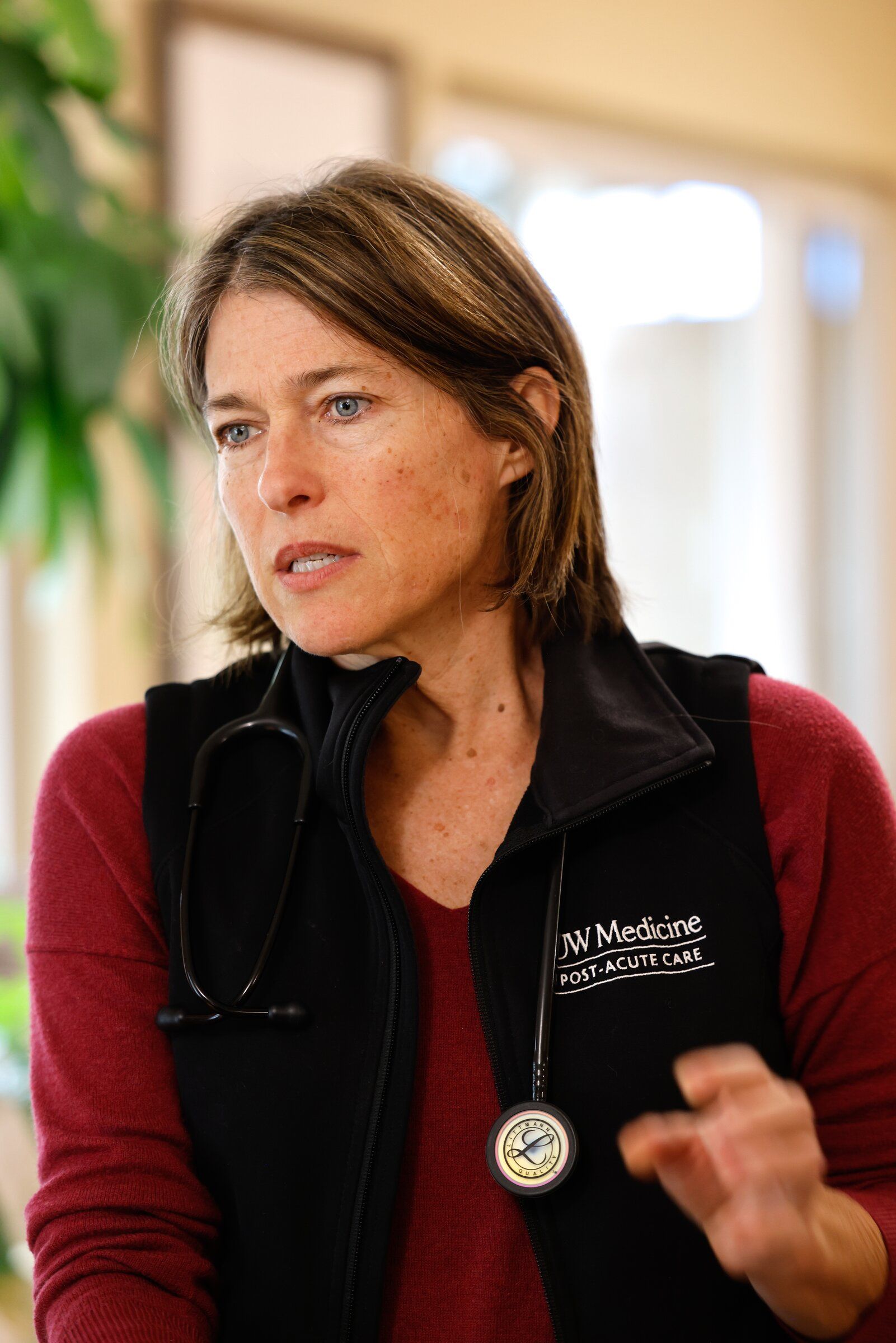 Janice Ingham, a nurse practitioner with UW Medicine working at Queen Anne Healthcare, praised Harborview Medical Center's efforts to get patients out of the hospital more quickly and into post-acute care settings. (Karen Ducey / The Seattle Times)