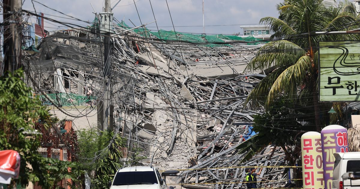A 9-story building under construction in Philippines collapses, possibly trapping dozens of workers