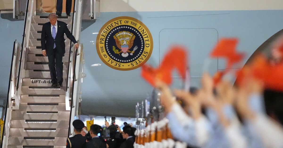 Photos of Trump in China for talks with Xi Jinping