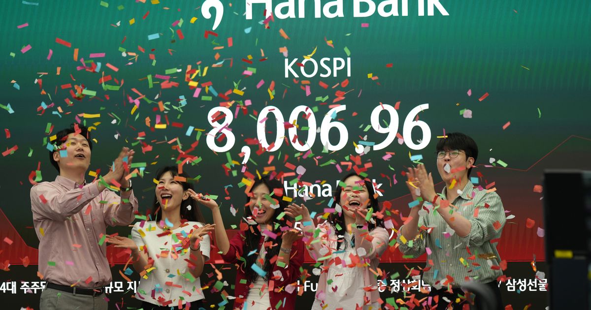 Asian stocks are lower after South Korea’s Kospi hits records, as Trump wraps up Beijing trip