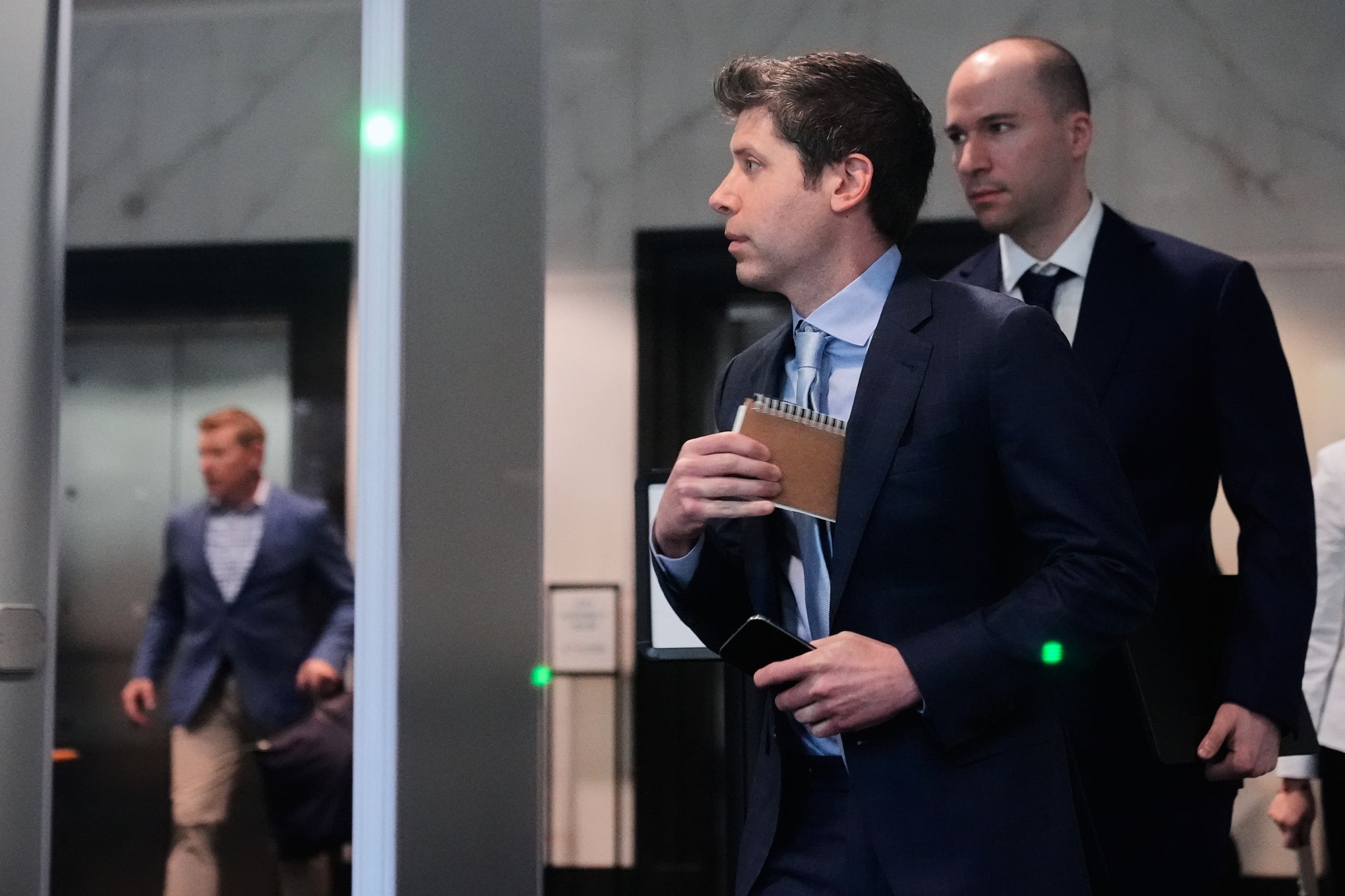 Sam Altman arrives at federal court during a legal dispute with Elon Musk