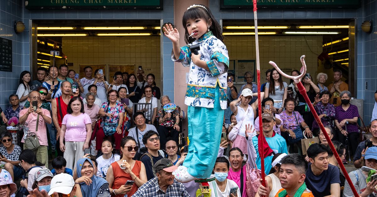 Revelers pack a Hong Kong island for a bun festival, a century-old tradition