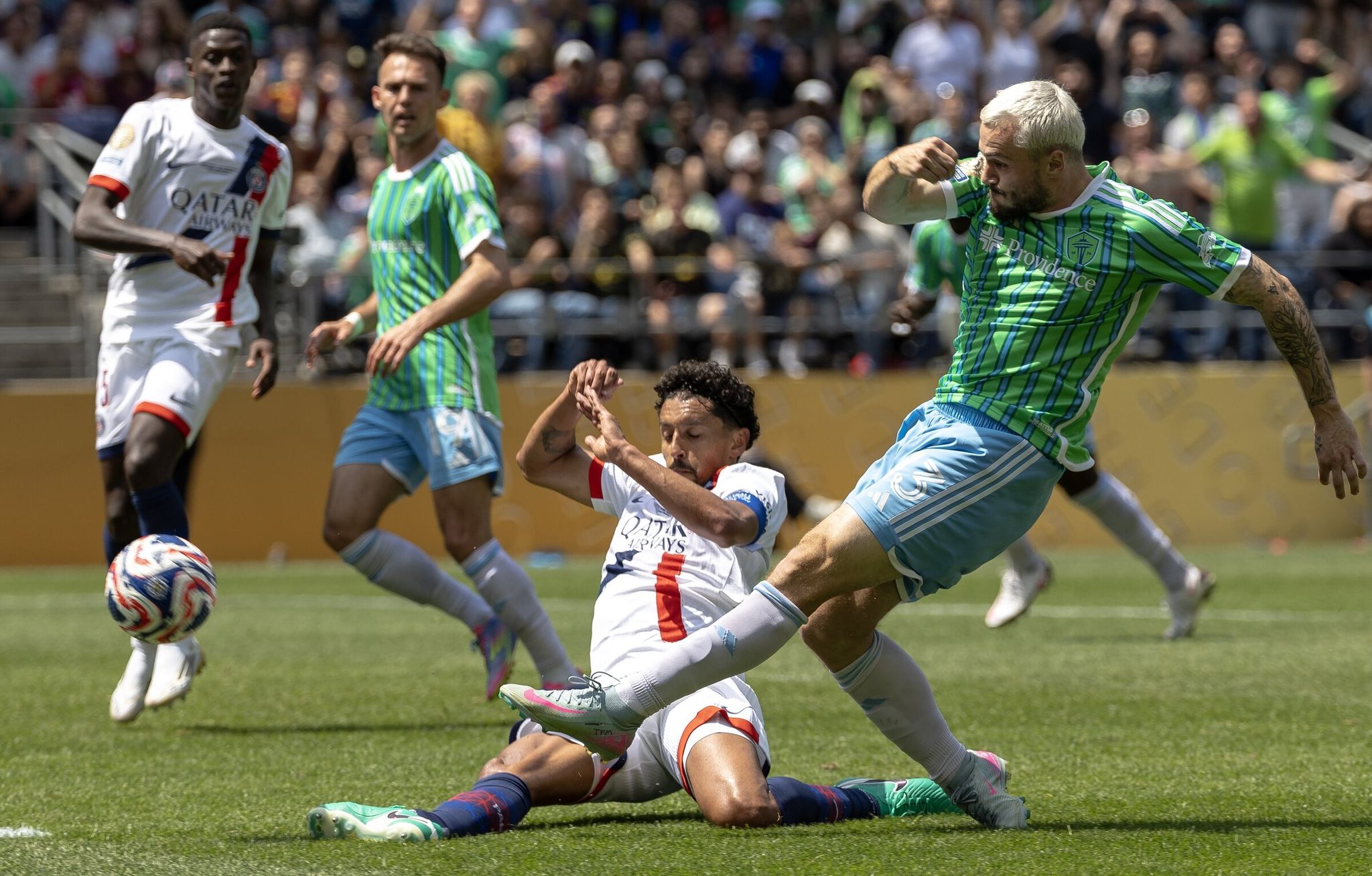 Seattle Sounders forward Jordan Morris shoots as Paris Saint-Germain defender Marquinhos defends in the second half of a Club World Cup match in June 2025. (Nick Wagner / The Seattle Times)