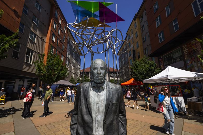 A statue of civil rights advocate Roberto Maestas at Plaza Roberto Maestas at El Centro de la Raza is seen late last month in Seattle’s Beacon Hill neighborhood. (Ken Lambert / The Seattle Times)